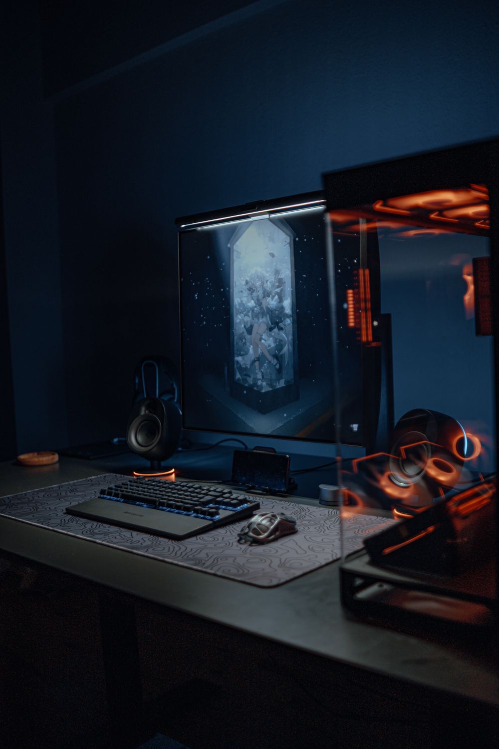 A gaming PC setup at night